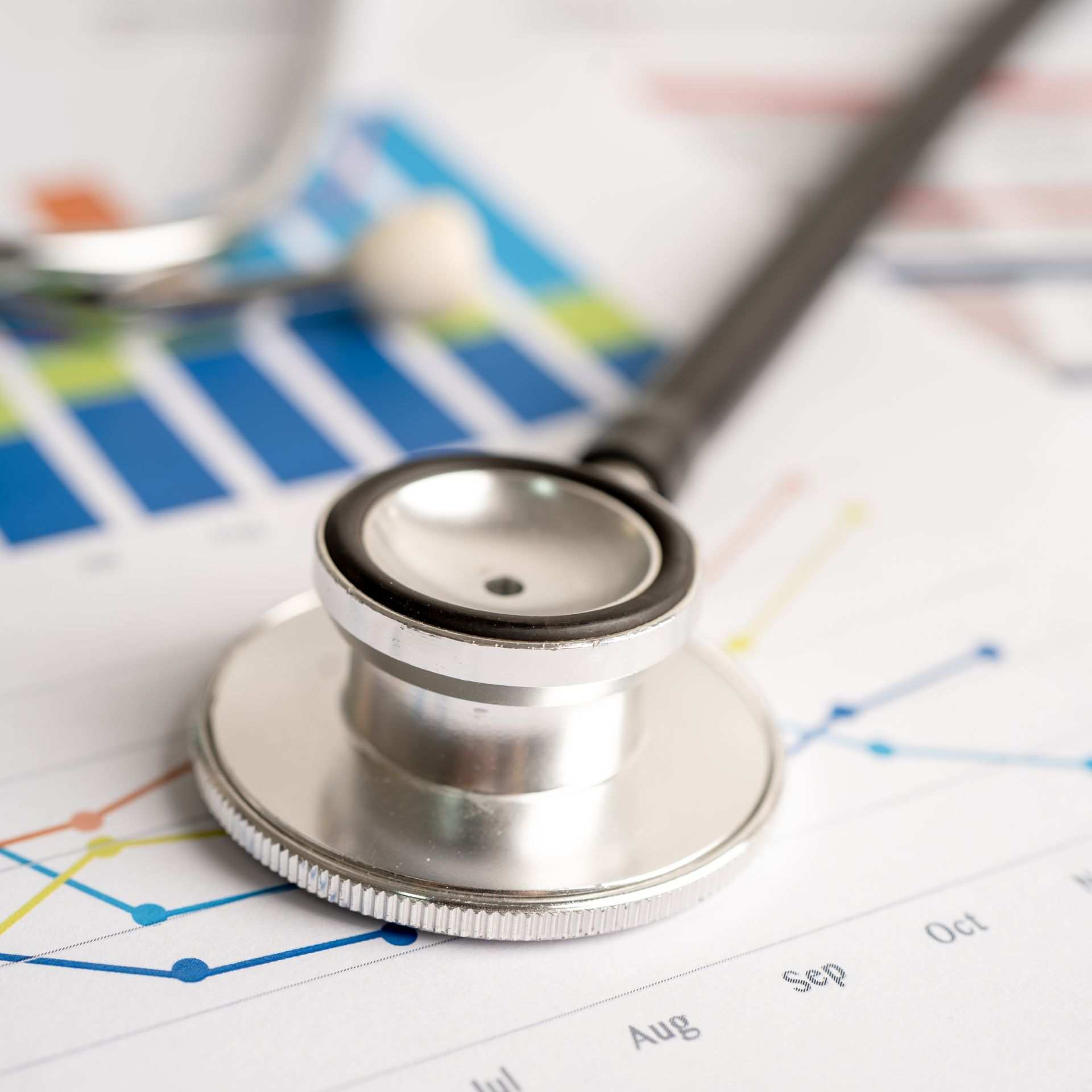 Stethoscope on chart and graph paper