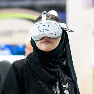 Female wearing Healthy Mind VR at WHX Tech 2025