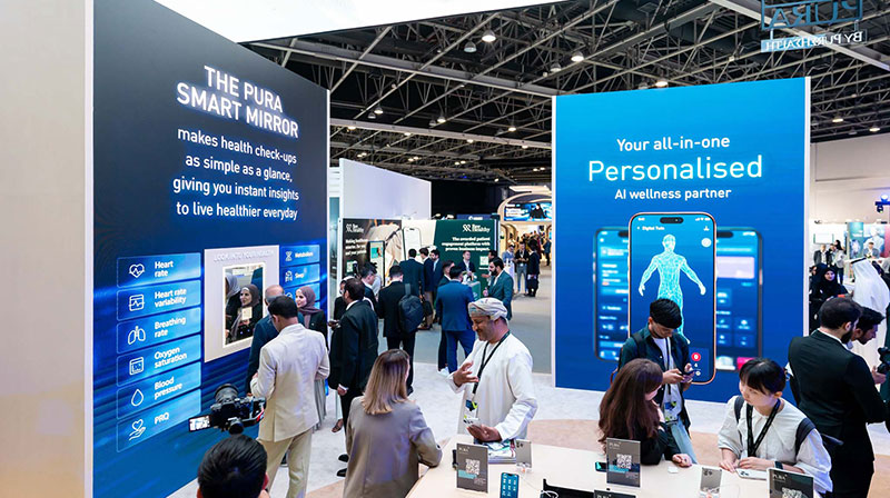 Attendees at Pure Health stand at WHX Tech 2025