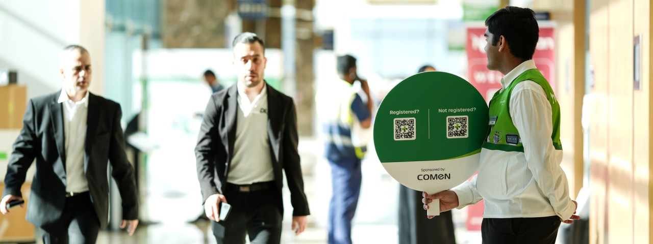 Attendees arriving at the conference