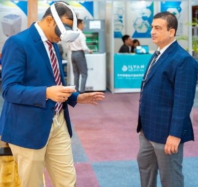 Attendee testing an exhibitor product at World Health Expo Nairobi