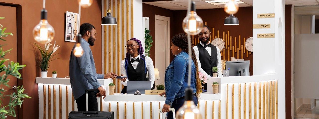 People checking into a hotel