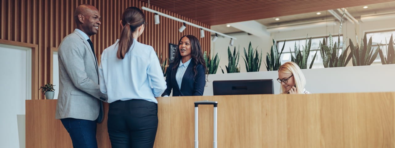 Guests checking in to a hotel.